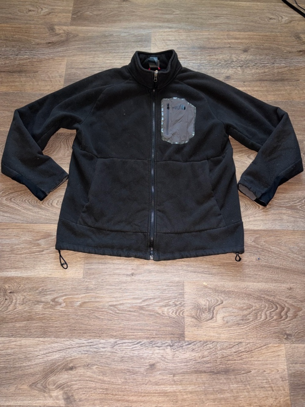 The North Face Black Fleece Jacket with Light Gray Chest Pocket